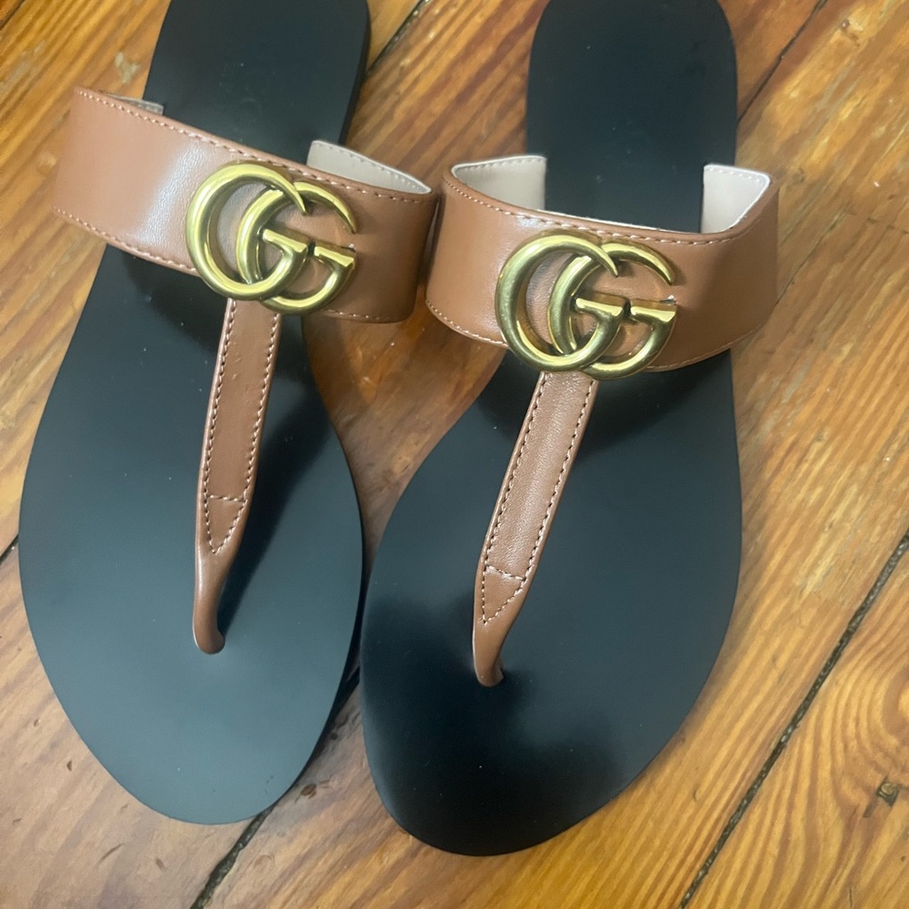 Brown and Black Sandals with Gold Logo
